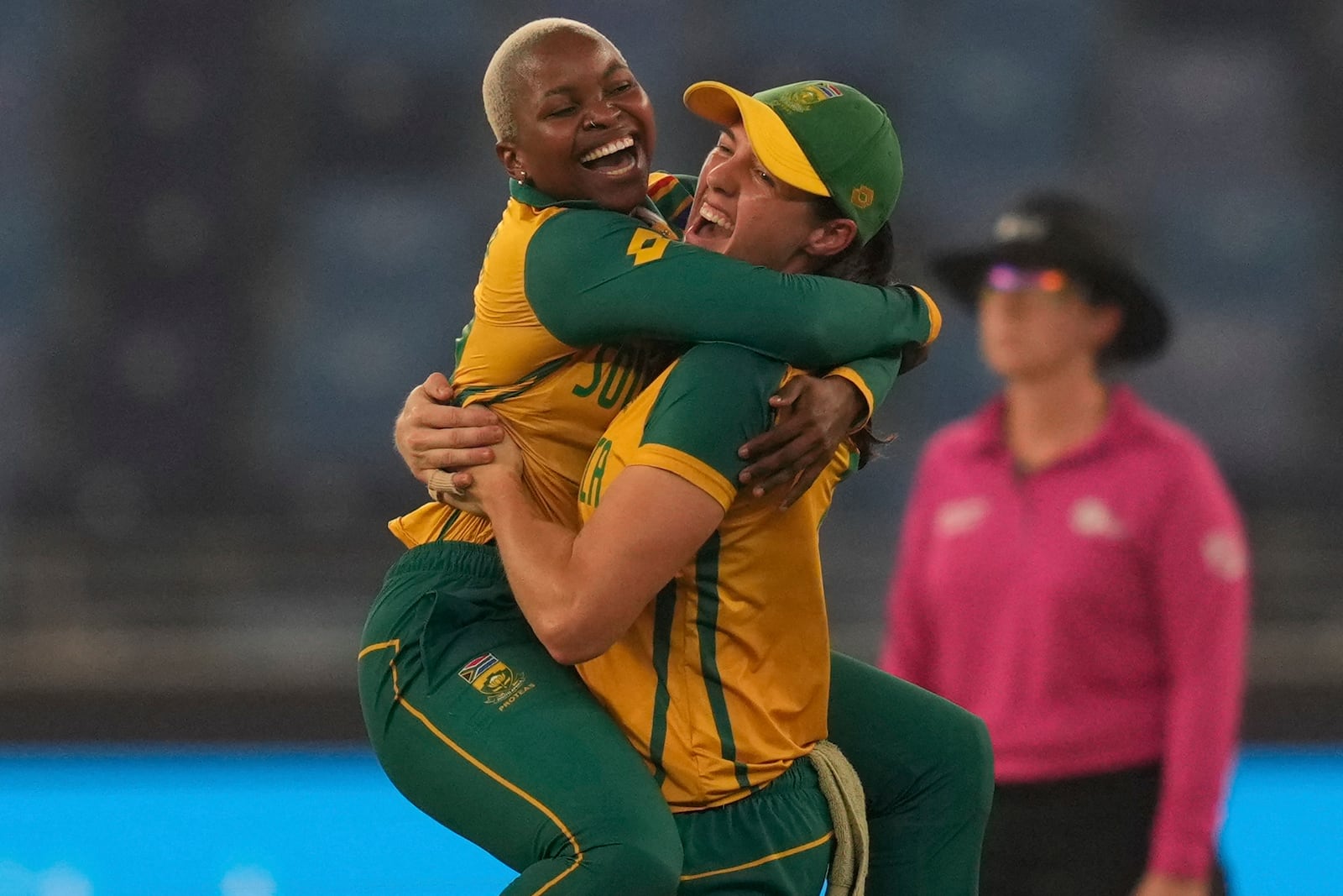 South Africa's Nonkululeko Mlaba, left, celebrates the wicket of New Zealand's Suzie Bates during the ICC Women's T20 World Cup 2024 final match between New Zealand and South Africa at Dubai, United Arab Emirates, Sunday, Oct. 20, 2024. (AP Photo/Altaf Qadri)