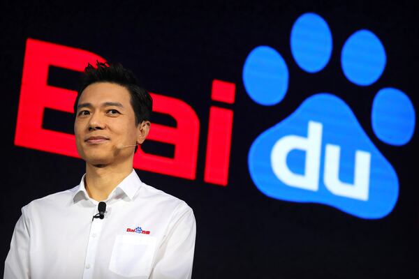 FILE - Baidu chairman and CEO Robin Li speaks during the 2018 Baidu World conference in Beijing, Thursday, Nov. 1, 2018. (AP Photo/Mark Schiefelbein, File)