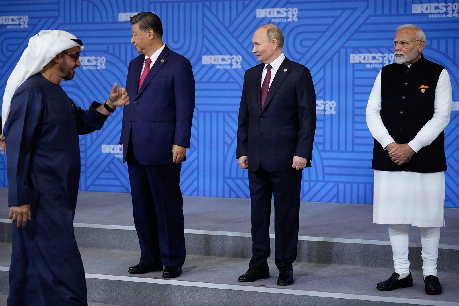 From left: United Arab Emirates President Sheikh Mohammed bin Zayed Al Nahyan, Chinese President Xi Jinping, Russian President Vladimir Putin and Indian Prime Minister Narendra Modi attend a family photo ceremony prior to the BRICS Summit plenary session in Kazan, Russia, Wednesday, Oct. 23, 2024. (AP Photo/Alexander Zemlianichenko, Pool)