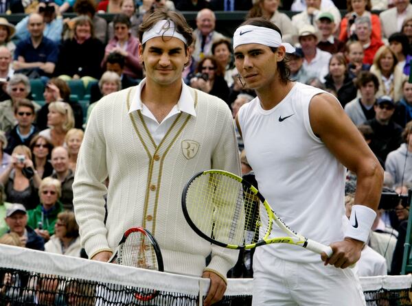 FILE - Switzerland's Roger Federer left, and Spain's Rafael Nadal pose for a photo prior to the start of the men's singles final on the Centre Court at Wimbledon, July 6, 2008 (AP Photo/Anja Niedringhaus, File)