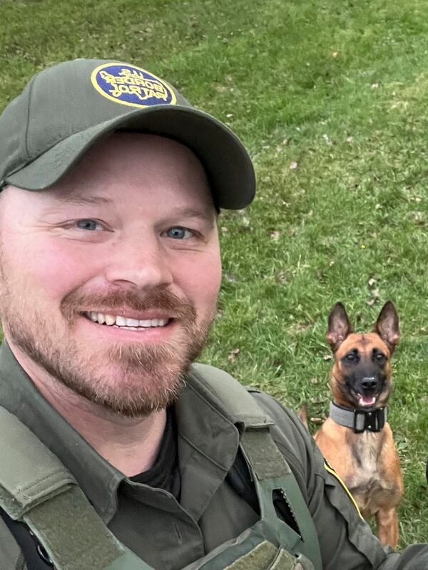 This undated image courtesy of Joan Mussa shows U.S. Border Patrol agent David Maland and his K9 partner, Cora. Maland was killed Monday, Jan. 20, 2025, following a traffic stop. (David Maland/Joan Mussa via AP)