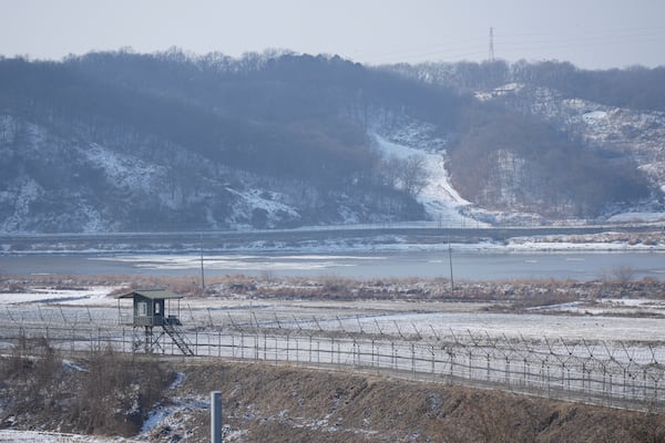 South Korean military's barbed-wire fence is seen near the snow covered field in Paju, South Korea, Wednesday, Jan. 29, 2025. (AP Photo/Lee Jin-man)