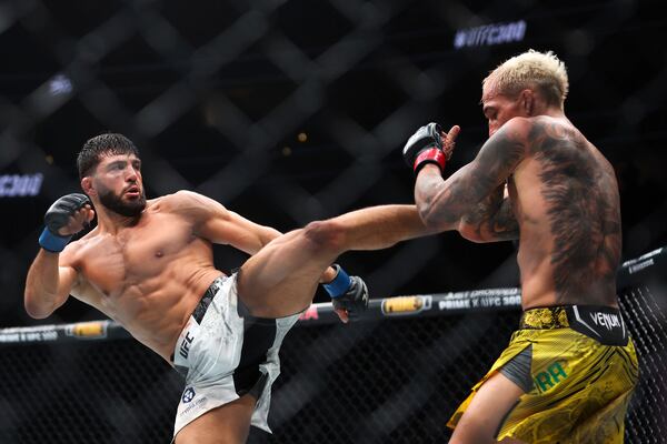 FILE - Arman Tsarukyan, left, kicks Charles Oliveira during a UFC 300 mixed martial arts lightweight bout Saturday, April 13, 2024, in Las Vegas. (Ellen Schmidt/Las Vegas Review-Journal via AP, file)