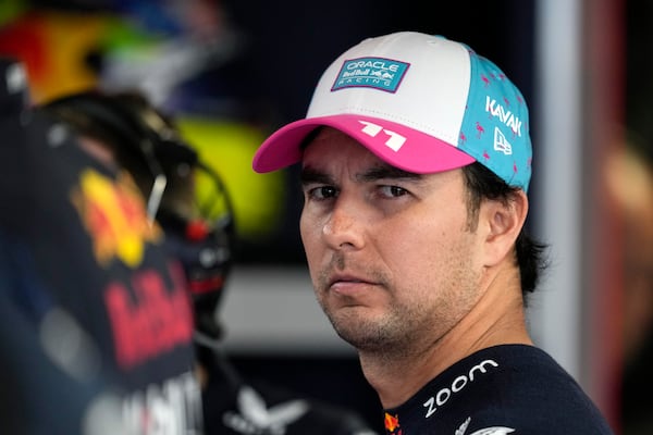 FILE - Red Bull driver Sergio Perez (11) waits for the Formula One Miami Grand Prix auto race to begin at the Miami International Autodrome, Sunday, May 7, 2023, in Miami Gardens, Fla. (AP Photo/Rebecca Blackwell, File)