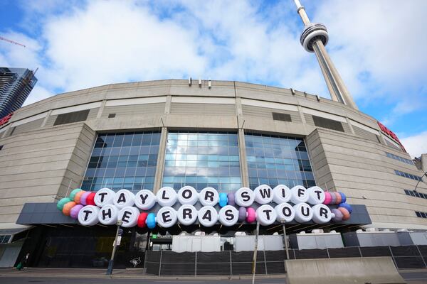 FILE.- A sign replicating the popular Taylor Swift bracelet is displayed in front of Rogers Centre promoting Swift's The Eras Tour in Toronto, on Nov. 13, 2024. (Chris Young/The Canadian Press via AP, File)