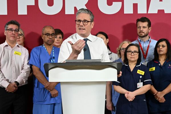 Britain's Prime Minister Keir Starmer gives a speech on reducing NHS wait times as he visits a healthcare provider in Surrey, England, Monday, Jan. 6, 2025, (Leon Neal/Pool Photo via AP)