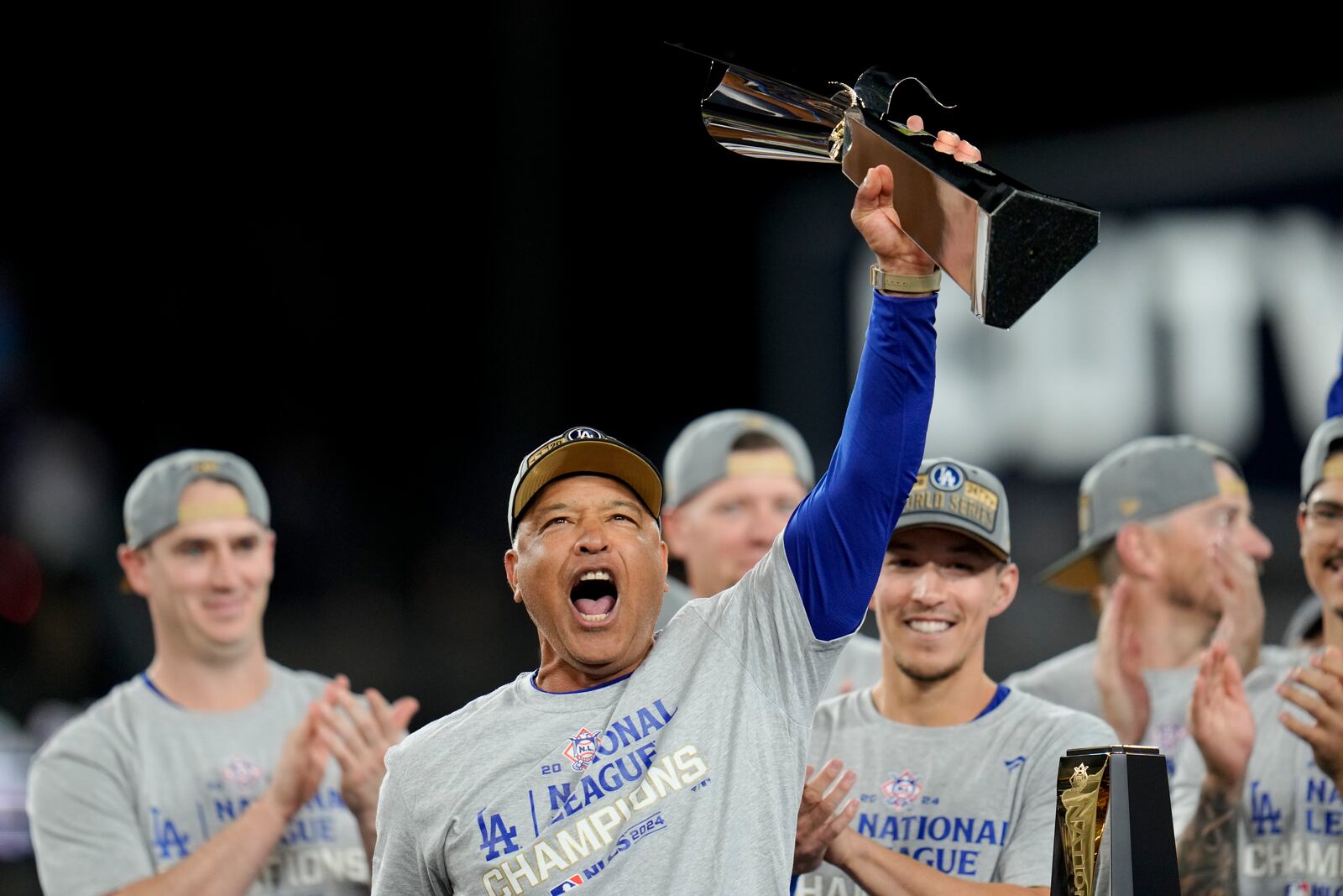 Los Angeles Dodgers manager Dave Roberts celebrates their win against the New York Mets in Game 6 of a baseball NL Championship Series, Sunday, Oct. 20, 2024, in Los Angeles. The Dodgers will face the New York Yankees in the World Series. (AP Photo/Julio Cortez)