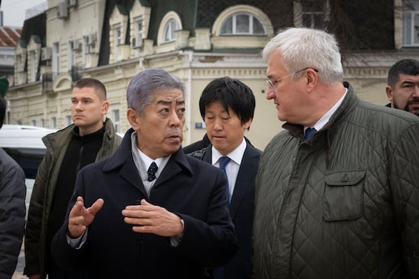 Japanese Foreign Minister Takeshi Iwaya, left, and Ukraine's Foreign Minister Andriiy Sybiha talk during their meeting in Kyiv, Ukraine, Saturday, Nov. 16, 2024. (AP Photo/Efrem Lukatsky)