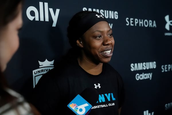 Vinyl's Arike Ogunbowale speaks following a practice session, Thursday, Jan. 16, 2025, in Medley, Fla., as the new 3-on-3 women's basketball league Unrivaled tips off this weekend. (AP Photo/Marta Lavandier)