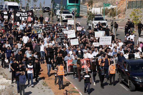 Palestinian citizens of Israel march against Israel's military operations in the Gaza Strip, in Umm al-Fahm, Israel, Friday, Nov. 15, 2024. (AP Photo/Mahmoud Illean