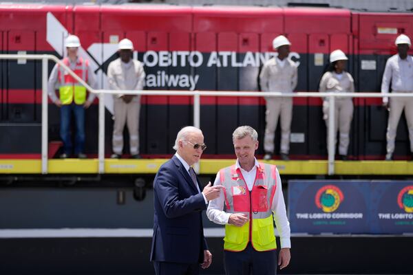 President Joe Biden and Chief Operating Officer of Lobito Atlantic Railway Nicolas Gregoire tour the Lobito Port Terminal in Lobito, Angola, on Wednesday, Dec. 4, 2024. (AP Photo/Ben Curtis)