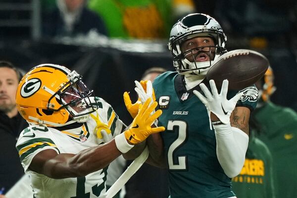 Philadelphia Eagles cornerback Darius Slay Jr. (2) intercepts a pass intended for Green Bay Packers wide receiver Dontayvion Wicks (13) during the first half of an NFL wild-card playoff football game Sunday, Jan. 12, 2025, in Philadelphia. (AP Photo/Matt Slocum)