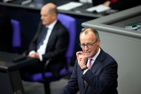 Friedrich Merz, German opposition leader and chairman of the Christian Democratic Union (CDU) party, speaks during a session of the German parliament 'Bundestag' in Berlin, Germany, Friday, Jan. 31, 2025. (AP Photo/Ebrahim Noroozi)