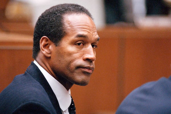 FILE - O.J. Simpson sits at his arraignment in Superior Court in Los Angeles on July 22, 1994. (AP Photo/Pool/Lois Bernstein, Pool, File)