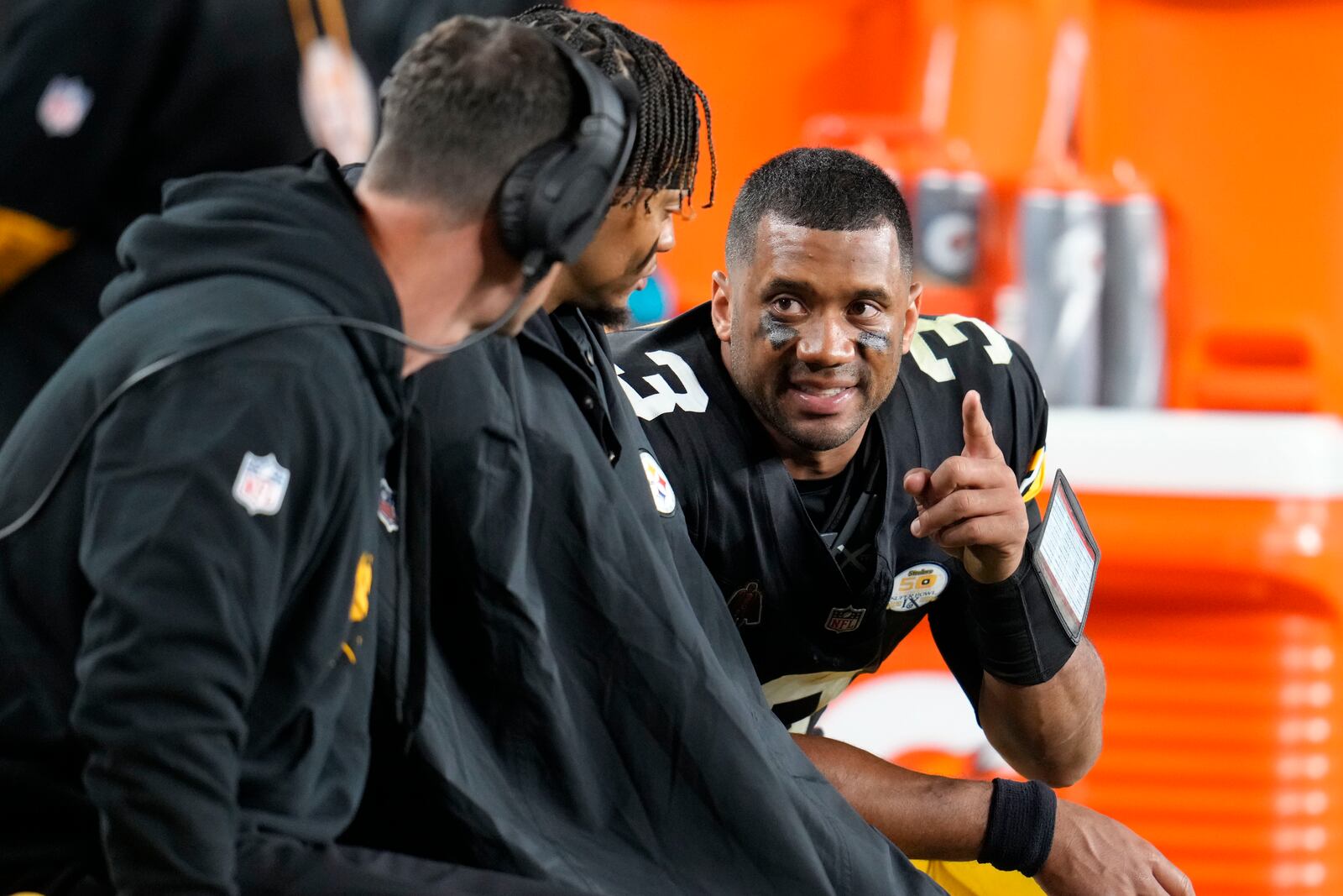 Pittsburgh Steelers quarterback Russell Wilson (3) talks on the bench in the second half of an NFL football game against the New York Jets in Pittsburgh, Sunday, Oct. 20, 2024. (AP Photo/Gene J. Puskar)