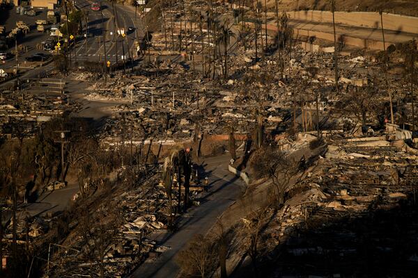 The Palisades Fire leaves total devastation in the Pacific Palisades neighborhood of Los Angeles, Monday, Jan. 13, 2025. (AP Photo/John Locher)