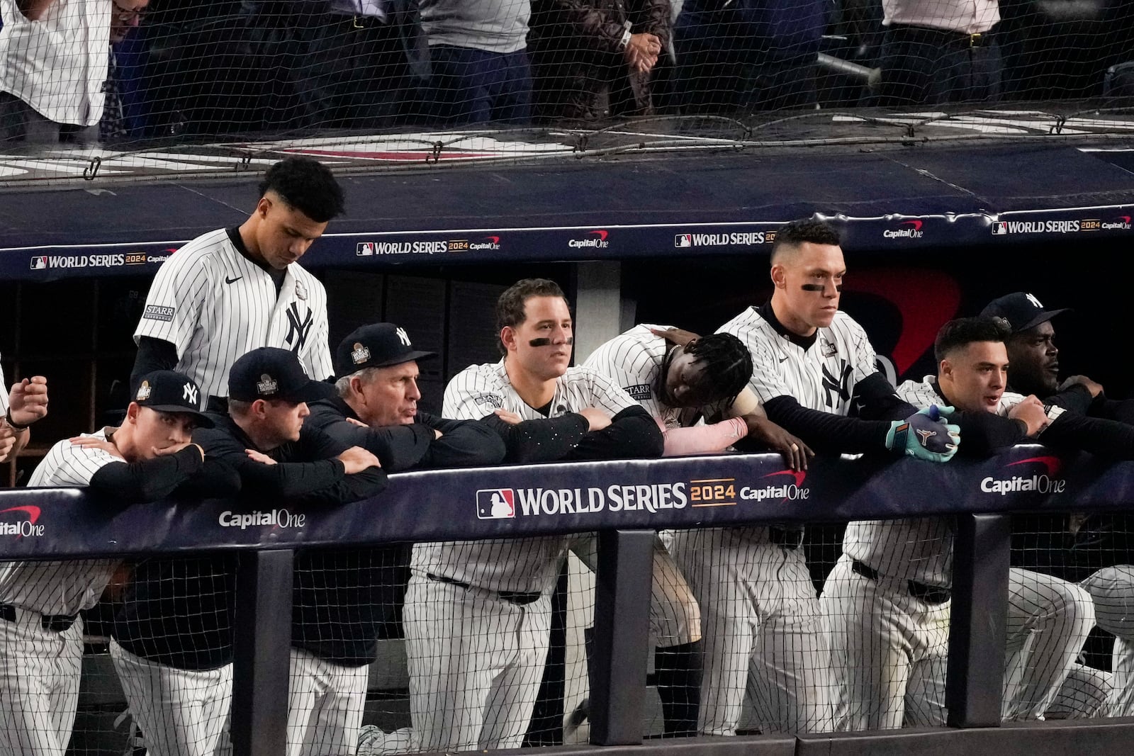 The New York Yankees watch during their loss against the Los Angeles Dodgers in Game 5 of the baseball World Series, Wednesday, Oct. 30, 2024, in New York. (AP Photo/Frank Franklin II)