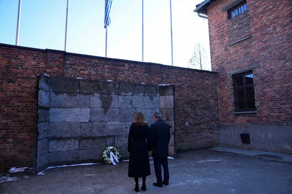 Britain's Prime Minister Keir Starmer and his wife Victoria Starmer visit the Memorial And Museum Auschwitz-Birkenau, a former Nazi German concentration and extermination camp, in Oswiecim, Poland, Friday Jan. 17, 2025. (Aleksandra Szmigiel/Pool via AP)