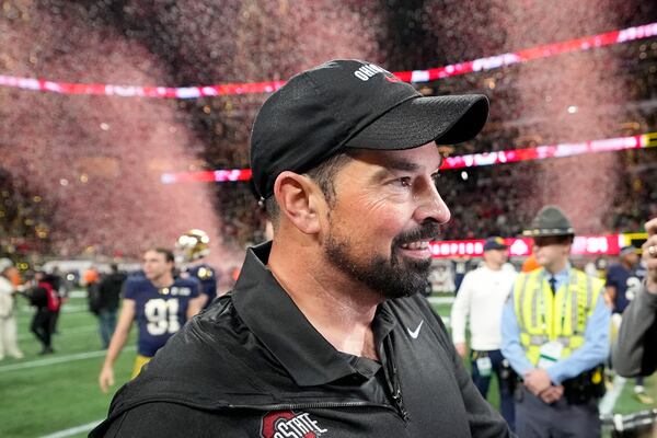 Ohio State head coach Ryan Day celebrates after their win against Notre Dame in the College Football Playoff national championship game Monday, Jan. 20, 2025, in Atlanta. (AP Photo/Brynn Anderson)