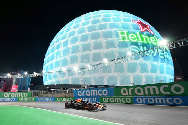 Red Bull driver Max Verstappen, of the Netherlands, runs a warm up lap during the F1 Las Vegas Grand Prix auto race, Saturday, Nov. 23, 2024, in Las Vegas. (AP Photo/Rick Scuteri)