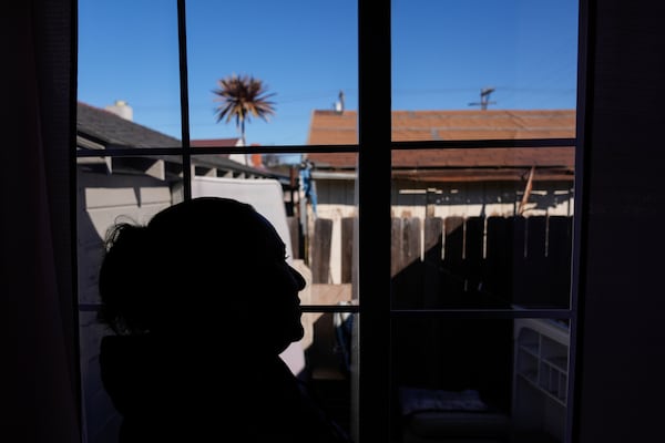 Carmen, who only shared her first name out of fear she could be targeted by immigration officials, is photographed at her apartment Wednesday, Jan. 22, 2025, in the San Francisco Bay Area. (AP Photo/Godofredo A. Vásquez)