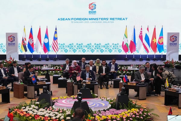 Malaysia's Foreign Minister Mohamad Hasan, center, delivers his speech during the Association of Southeast Asian Nations (ASEAN) Foreign Ministers' Retreat in Langkawi Island, Malaysia, Sunday, Jan. 19, 2025. (AP Photo/Azneal Ishak, Pool)