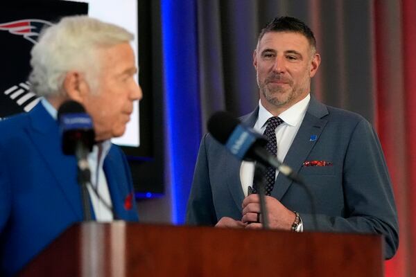 New England Patriots head coach Mike Vrabel listens to team owner Robert Kraft while being introduced during an availability, Monday, Jan. 13, 2025, in Foxborough, Mass. (AP Photo/Charles Krupa)