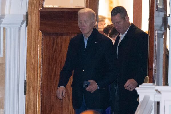 President Joe Biden steps out of St. Mary, Our Lady of the Isle Catholic Church in downtown Nantucket, Mass., Saturday, Nov. 30, 2024. (AP Photo/Jose Luis Magana)