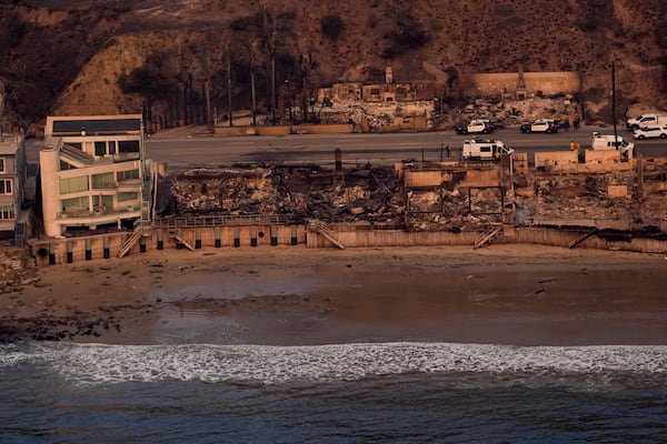 Beach front properties are left destroyed by the Palisades Fire, in this aerial view, Thursday, Jan. 9, 2025 in Malibu, Calif. (AP Photo/Mark J. Terrill)