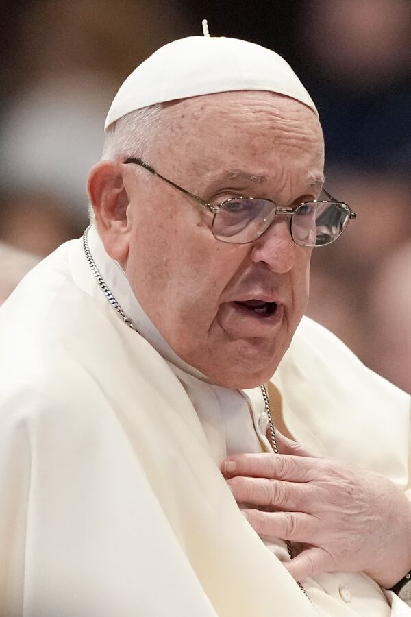 Pope Francis meets with Italian pilgrims participating in the Camino de Santiago, in St. Peter's Basilica at the Vatican, Thursday, Dec. 19, 2024. (AP Photo/Andrew Medichini)