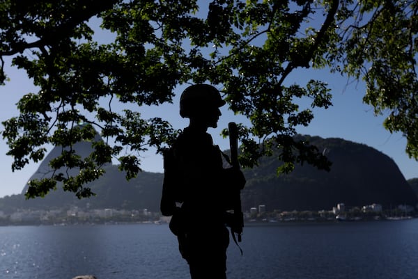 A soldier patrols the perimeters of the Museum of Modern Art, the venue of the G20 summit in Rio de Janeiro, Monday, Nov. 18, 2024. (AP Photo/Bruna Prado)