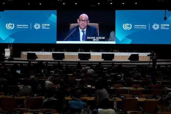 Simon Stiell, United Nations climate chief, speaks during a closing plenary session at the COP29 U.N. Climate Summit, Sunday, Nov. 24, 2024, in Baku, Azerbaijan. (AP Photo/Rafiq Maqbool)