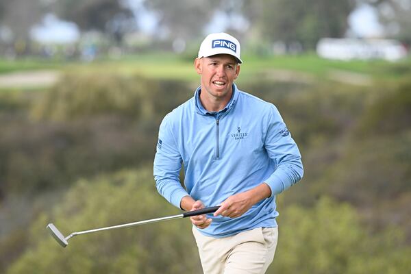 Sam Stevens reacts after missing a birdie putt on the 13th hole on the South Course at Torrey Pines during the final round of the Farmers Insurance Open golf tournament Saturday, Jan. 25, 2025, in San Diego. (AP Photo/Denis Poroy)