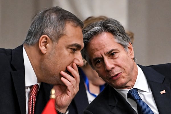 Turkey's Foreign Minister Hakan Fidan, left, speaks with US Secretary of State Antony Blinken during a meeting with the foreign ministers of the Arab Contact Group on Syria in Jordan's southern Red Sea coastal city of Aqaba, Saturday Dec. 14, 2024. (Andrew Caballero-Reynolds/Pool via AP)