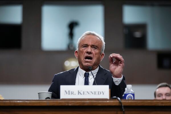 Robert F. Kennedy Jr., President Donald Trump's choice to be Secretary of Health and Human Services, appears before the Senate Finance Committee for his confirmation hearing, at the Capitol in Washington, Wednesday, Jan. 29, 2025. (AP Photo/Ben Curtis)