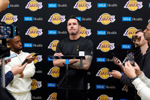 Los Angeles Lakers coach JJ Redick recounts that he and his family lost their house in the deadly Pacific Palisades wildfire during an NBA basketball news conference at the UCLA Health Training Center in El Segundo, Calif., Friday, Jan. 10, 2025. (AP Photo/Damian Dovarganes)