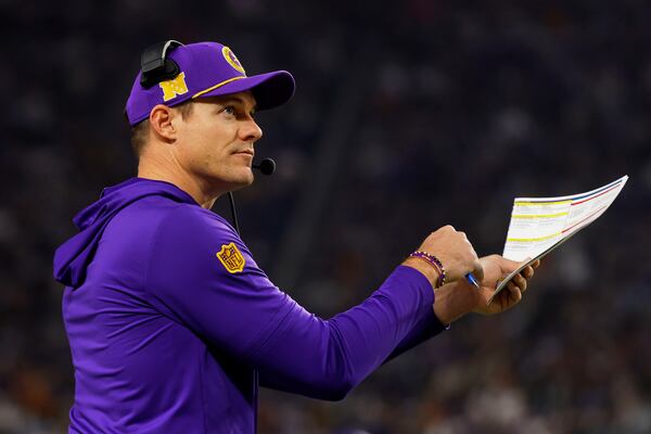 Minnesota Vikings head coach Kevin O'Connell calls a timeout during the first half of an NFL football game against the Green Bay Packers Sunday, Dec. 29, 2024, in Minneapolis. (AP Photo/Bruce Kluckhohn)