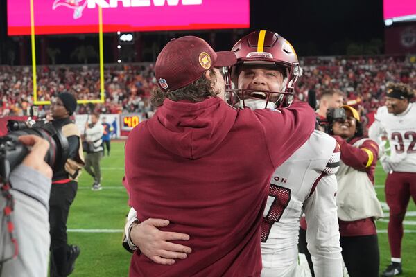 FILE - Washington Commanders place kicker Zane Gonzalez (47) celebrates after an NFL football Wild Card playoff game against the Tampa Bay Buccaneers, Jan 12, 2025, in Tampa, Fla. (AP Photo/Peter Joneleit, File)