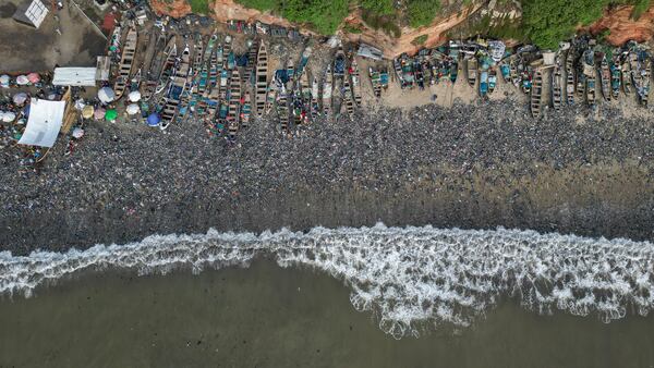 Textile waste pollutes the beach shore at Jamestown in Accra, Ghana, Saturday, Oct. 19, 2024. (AP Photo/Misper Apawu)