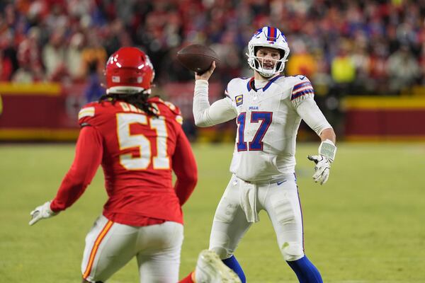 Buffalo Bills quarterback Josh Allen (17) drops back to pass as Kansas City Chiefs defensive end Mike Danna (51) defends during the second half of the AFC Championship NFL football game, Sunday, Jan. 26, 2025, in Kansas City, Mo. (AP Photo/Charlie Riedel)