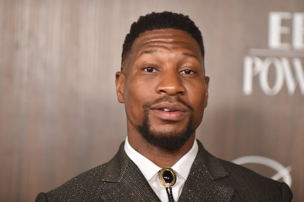 Jonathan Majors arrives at EBONY Power 100 on Sunday, Nov. 17, 2024, at nya studios WEST in Los Angeles. (Photo by Richard Shotwell/Invision/AP)