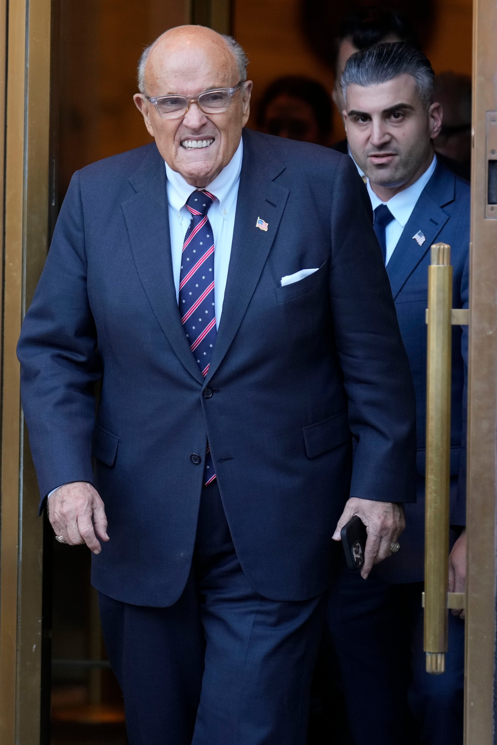 Former New York Mayor Rudy Giuliani leaves court in New York, Thursday, Nov. 7, 2024. (AP Photo/Seth Wenig)