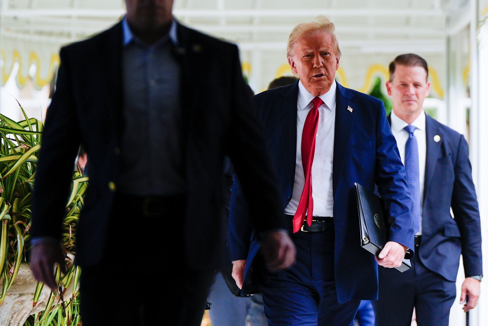 Republican presidential nominee former President Donald Trump arrives to a campaign event at his Mar-a-Lago estate, Tuesday, Oct. 29, 2024, in Palm Beach, Fla. (AP Photo/Julia Demaree Nikhinson)