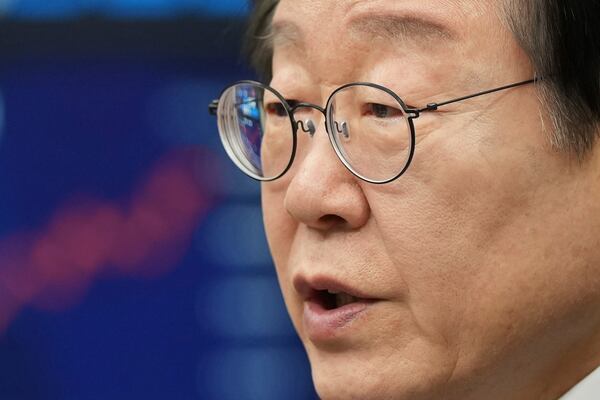 South Korea's main opposition Democratic Party leader Lee Jae-myung speaks during a press conference on removal of President Yoon Suk Yeol from office, at the party office at the National Assembly building in Seoul, South Korea, Sunday, Dec. 15, 2024. (AP Photo/Lee Jin-man)