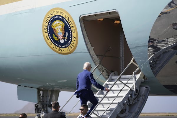 President Joe Biden boards Air Force One at Amilcar Cabral international airport on Sal island, Cape Verde Monday, Dec. 2, 2024, en route to Angola as he makes his long-promised visit to Africa. (AP Photo/Ben Curtis)