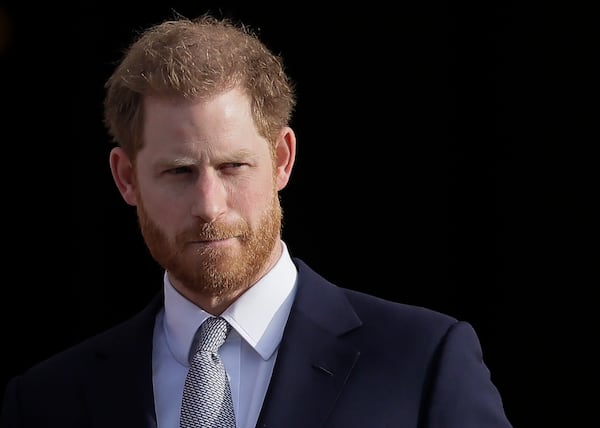 FILE - Britain's Prince Harry arrives in the gardens of Buckingham Palace in London, Jan. 16, 2020. (AP Photo/Kirsty Wigglesworth, File)