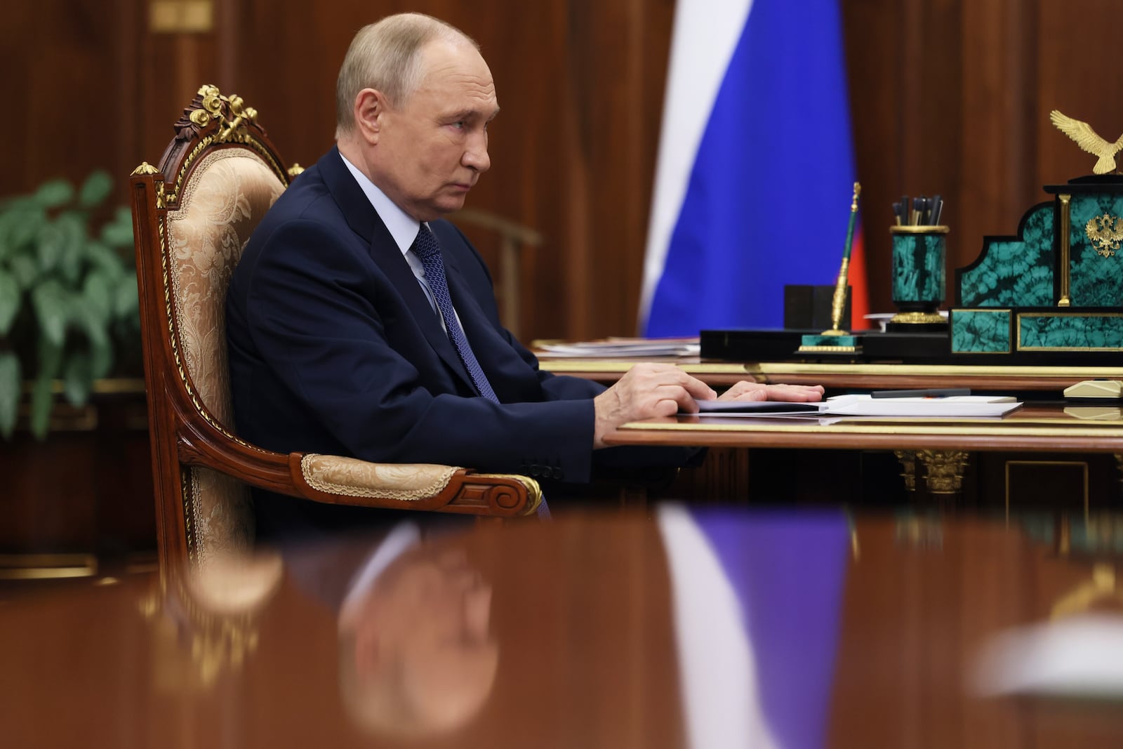 Russian President Vladimir Putin speaks with Head of Federal Customs Service Valery Pikalyov at the Kremlin in Moscow, Russia, Friday, Oct. 25, 2024. (Mikhail Metzel, Sputnik, Kremlin Pool Photo via AP)