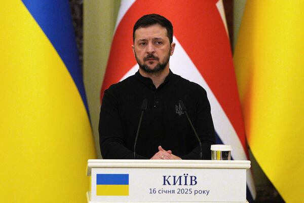 Ukrainian President Volodymyr Zelenskyy listens during a press conference with British Prime Minister Keir Starmer, at the start of their bilateral talks at Mariinskyi Palace, in Kyiv, Ukraine Thursday, Jan. 16, 2025. (Carl Court/Pool Photo via AP)