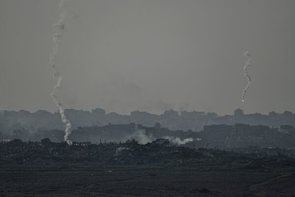 An Israeli army flare is seen over the Gaza Strip, as seen from Sderot, southern Israel, Monday, Jan. 6, 2025. (AP Photo/Tsafrir Abayov)