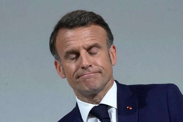 FILE - French President Emmanuel Macron reacts as he delivers a speech, Wednesday, June 12, 2024 in Paris. (AP Photo/Michel Euler, file)